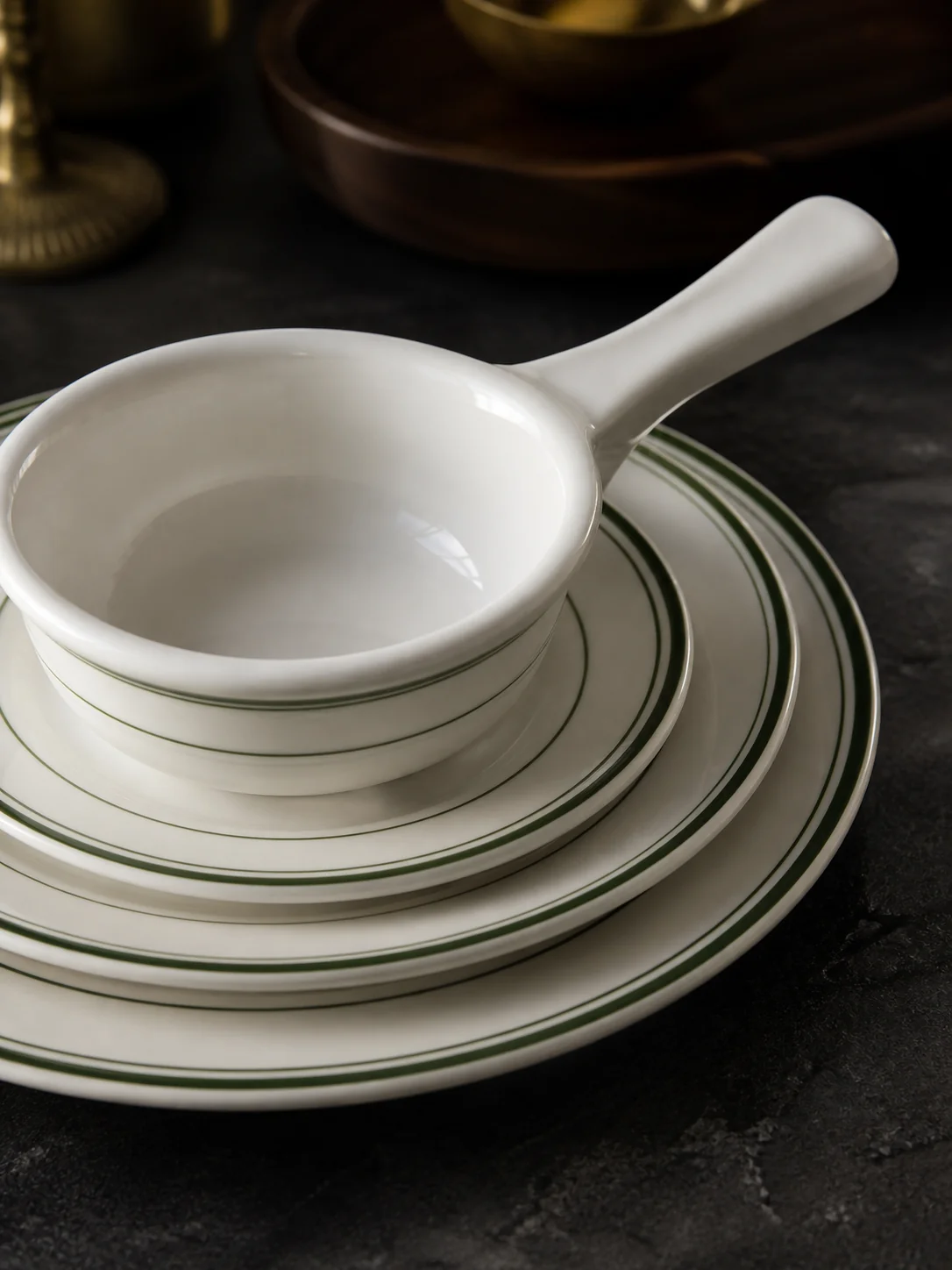 White tableware with fine-line rims, plates and cups - surface and colour detail