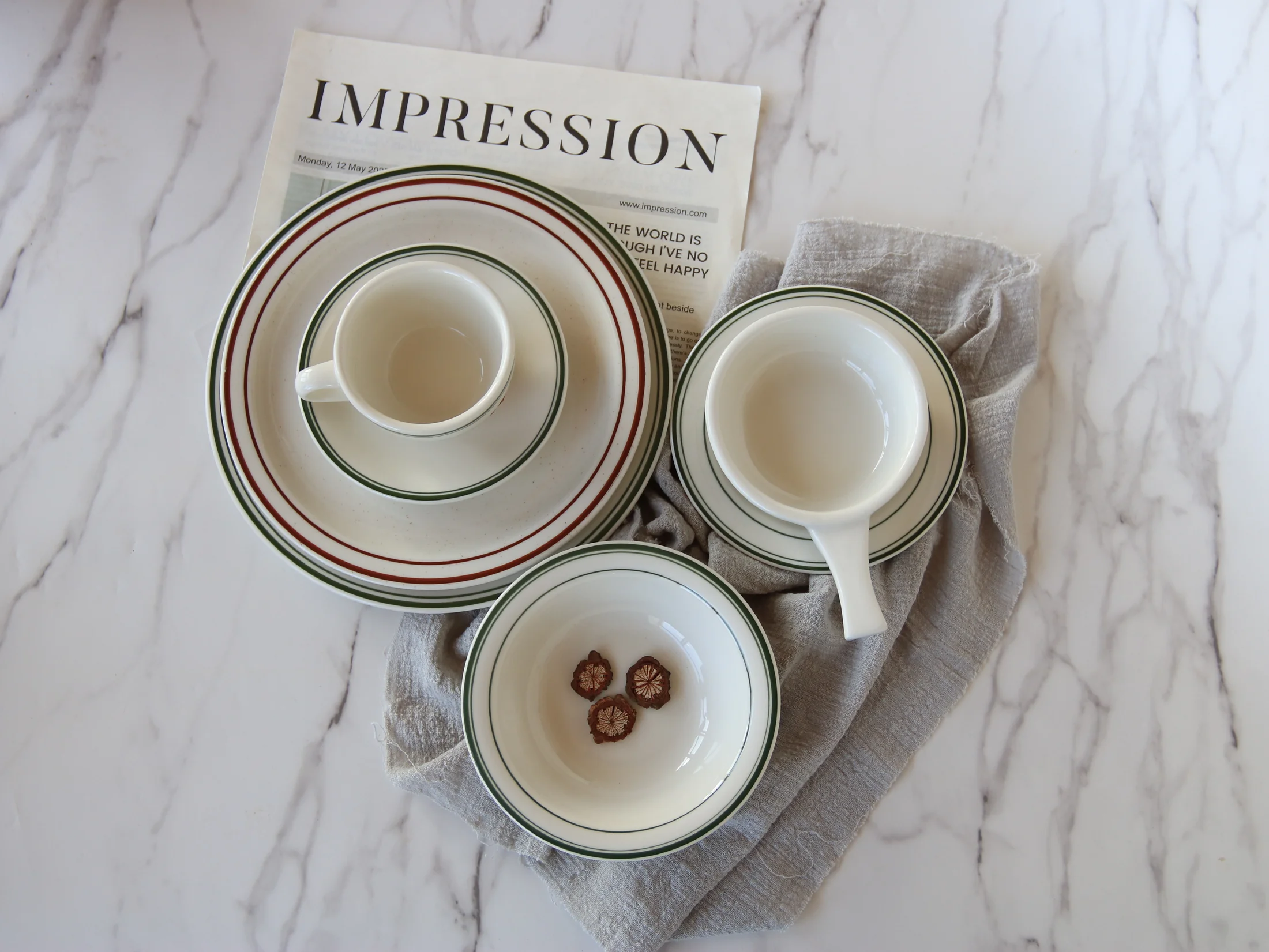 White tableware with fine-line rims, plates and cups - product photograph