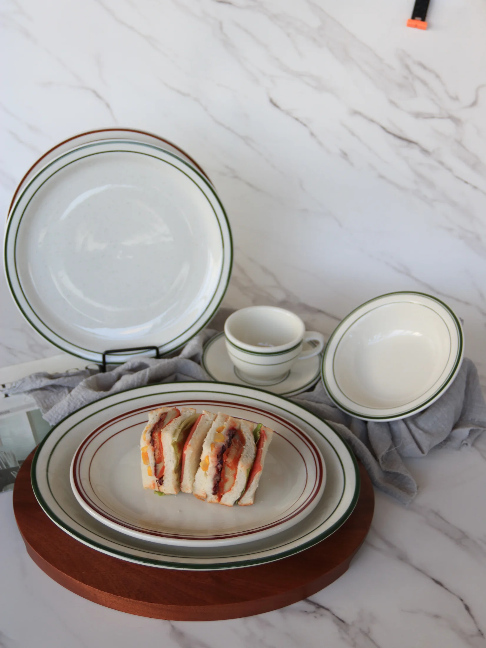 White tableware with fine-line rims, plates and cups - product photograph