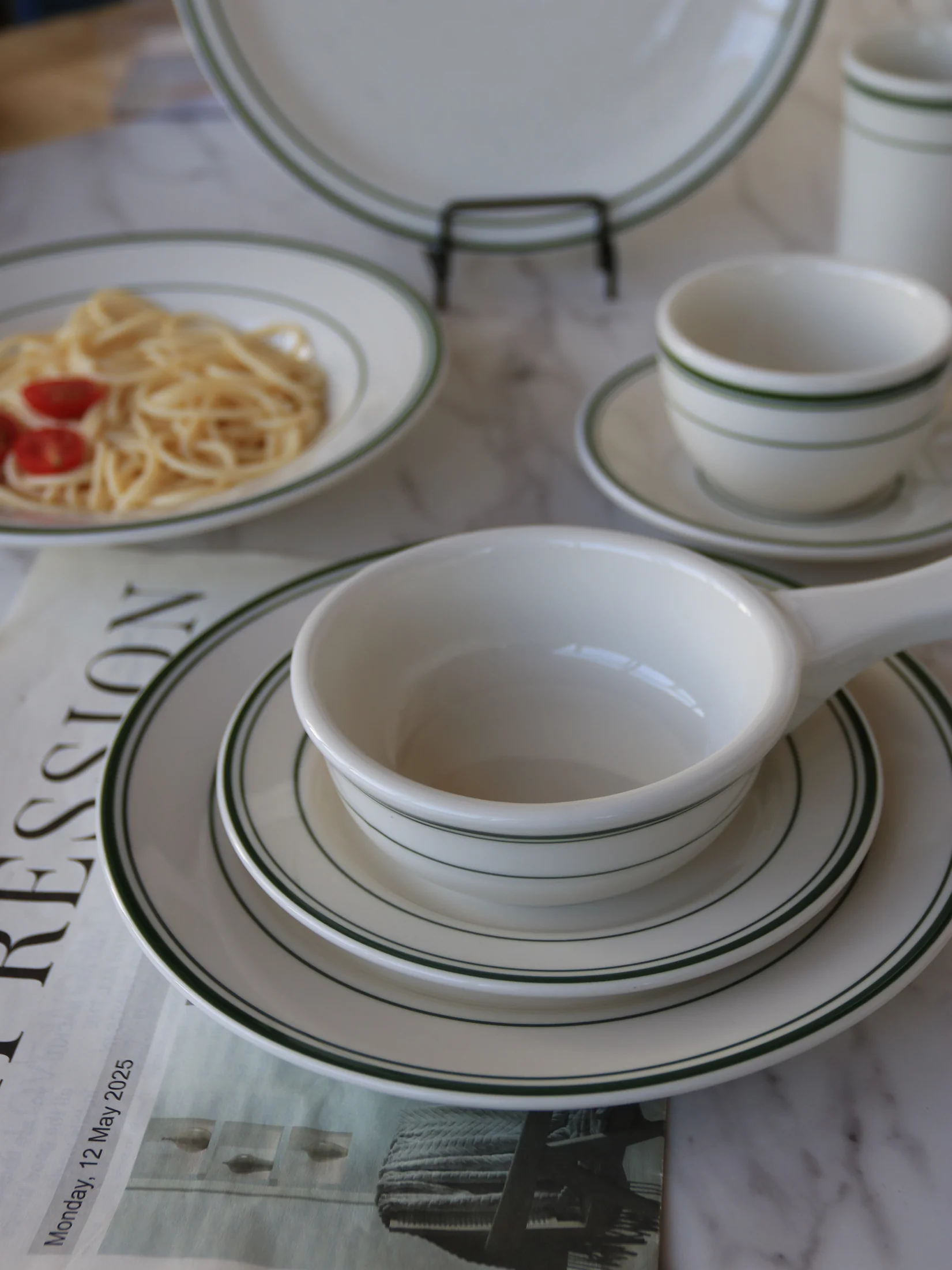 White tableware with fine-line rims, plates and cups - product photograph