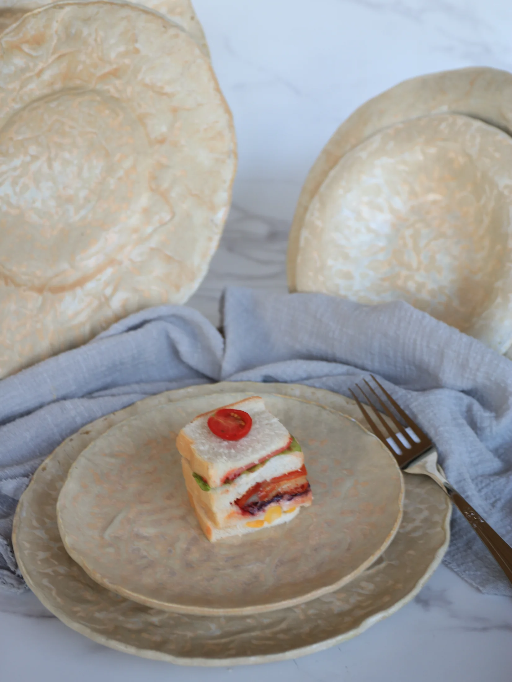 Cream and gold marble-effect presentation plates - product photograph