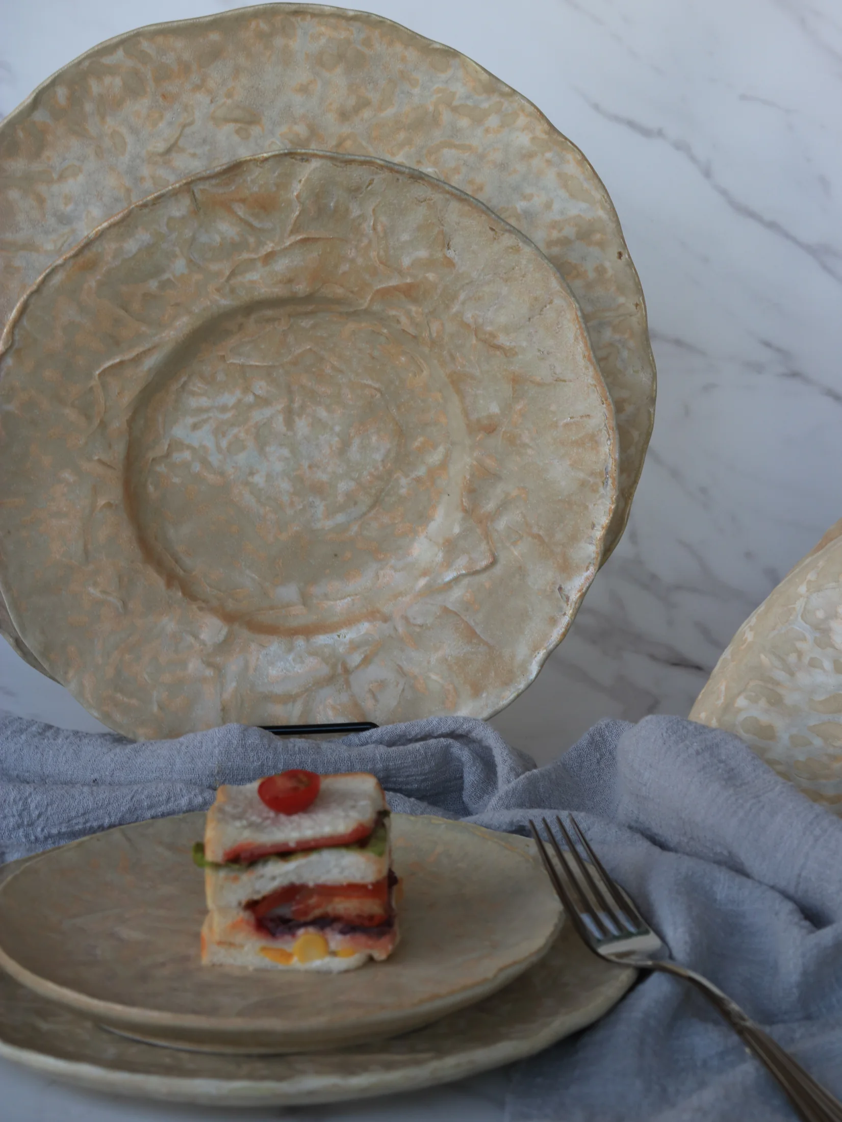 Cream and gold marble-effect presentation plates - product photograph