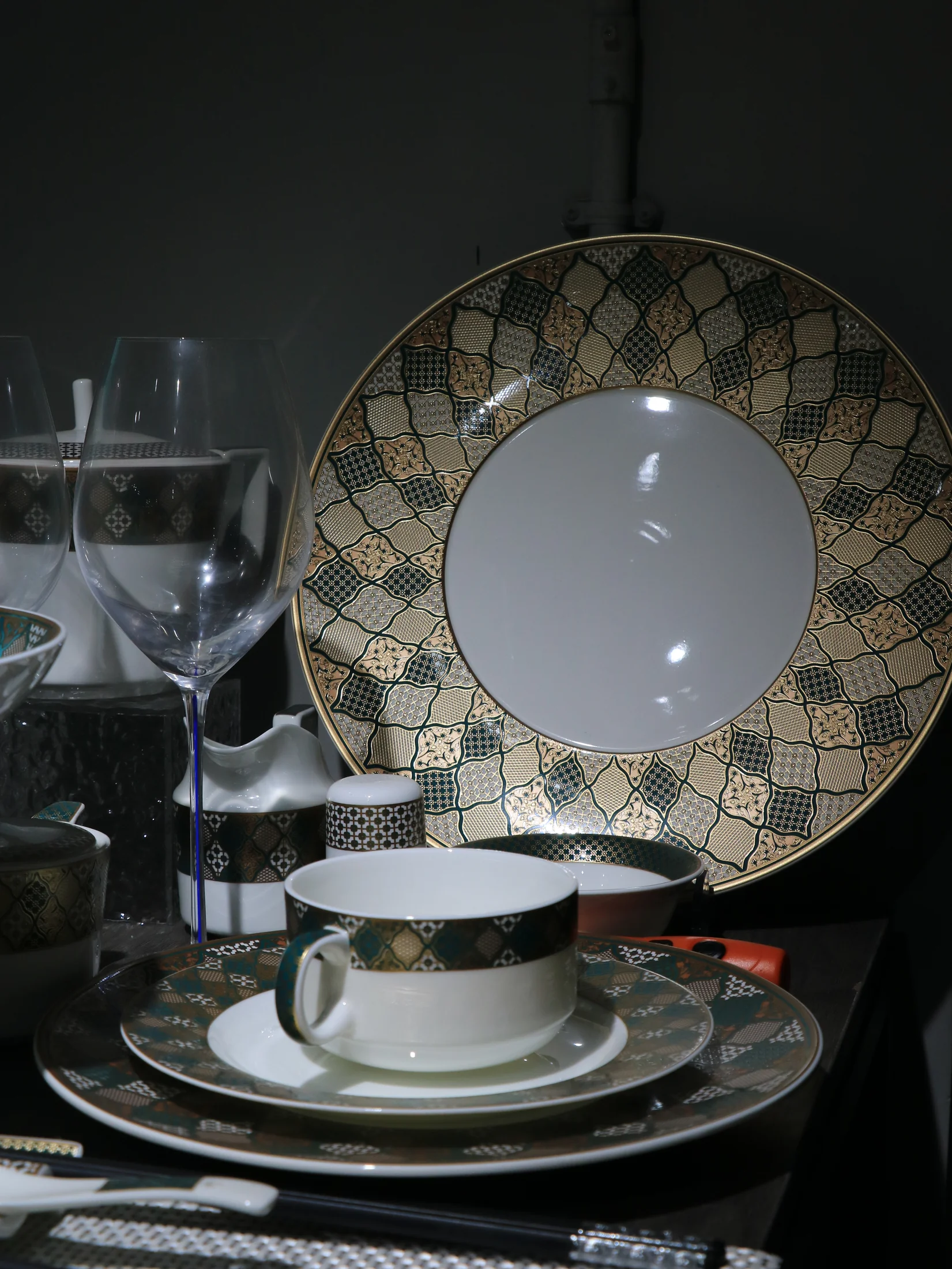 Blue and turquoise display plates with multi-tonal surface effects - product photograph